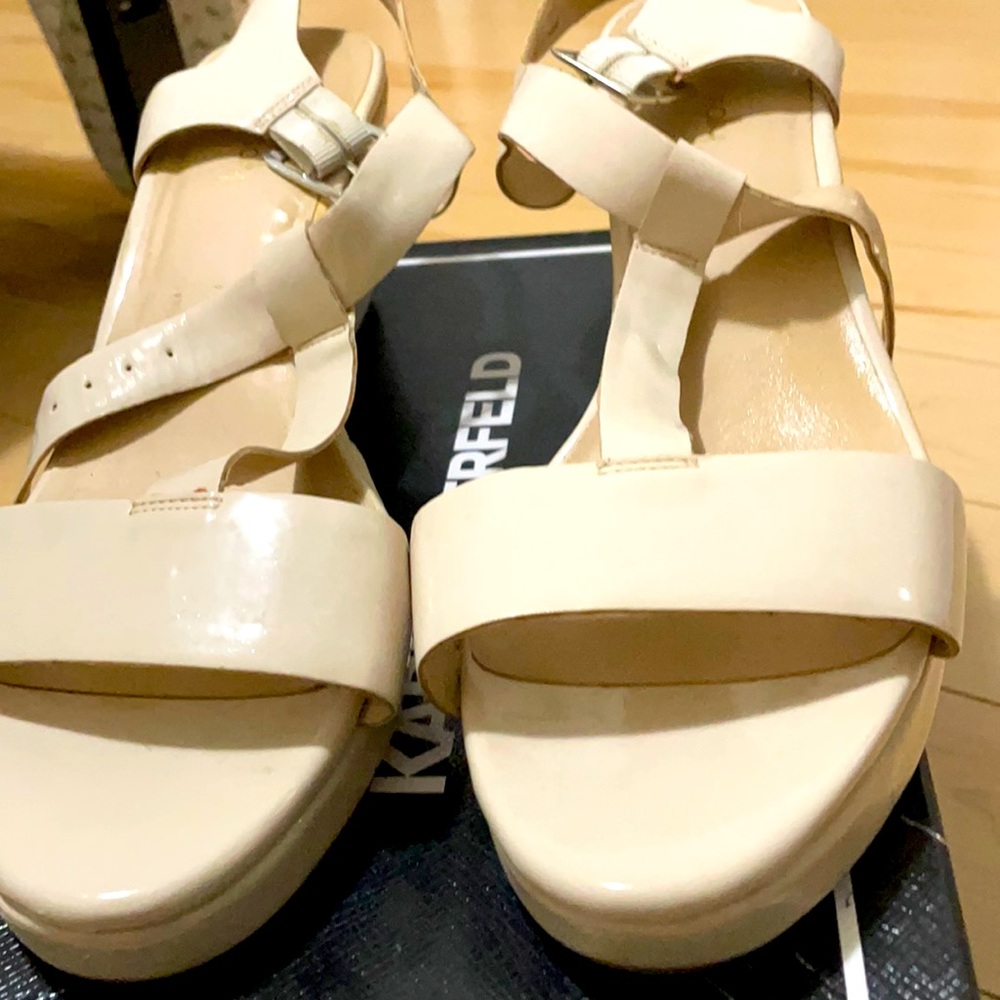 Lightly worn mint condition wedge cream shoes